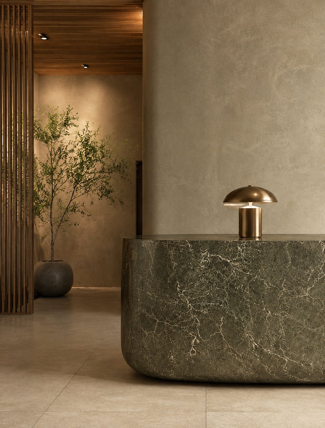 A single brass lamp lit on a dark green marble counter in an otherwise unlit room